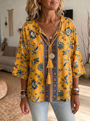 Bohemian Chic Green Floral Tunic - Relaxed Fit V-Neck Blouse with Statement Tassel Detail